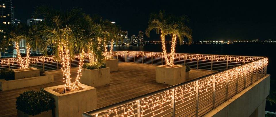 Rooftop terrace lights, Brickell skyline: warm white Christmas lighting idea for Brickell, FL from Mr. Christmas Lights, (786) 228-6649